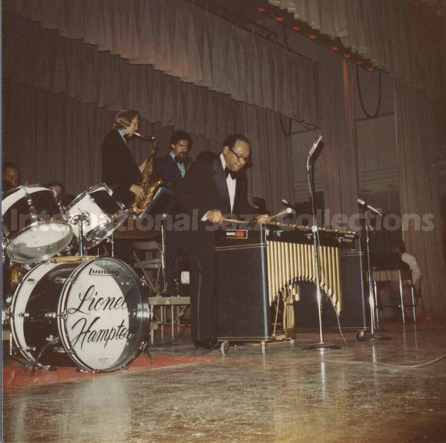 3 1/2 x 3 1/2 inch photograph. Lionel Hampton playing the vibraphone at Vernon Middle School, Vernon, CT
