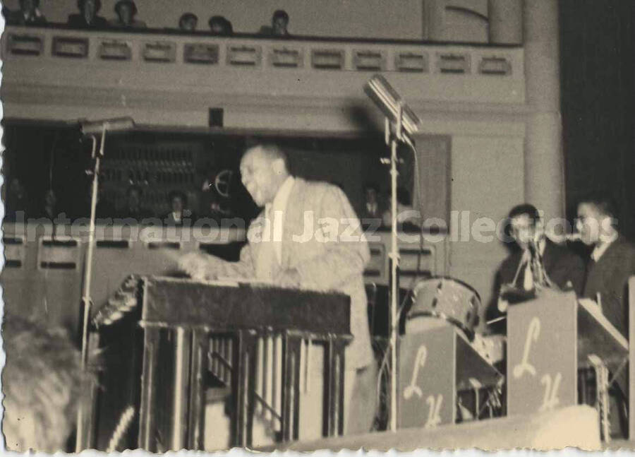 2 3/4 x 4 inch photograph. Lionel Hampton playing the vibraphone