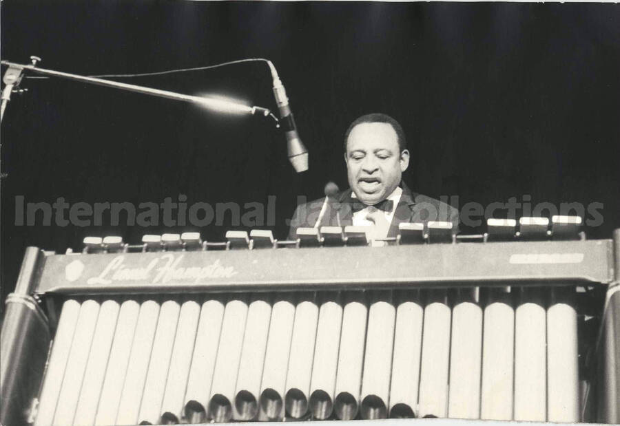 5 x 7 inch photograph. Lionel Hampton playing the vibraphone