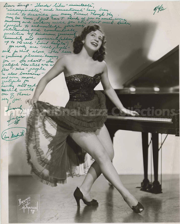 10 x 8 inch photograph. Unidentified woman. This photograph is dedicated to Lionel Hampton from Sugar