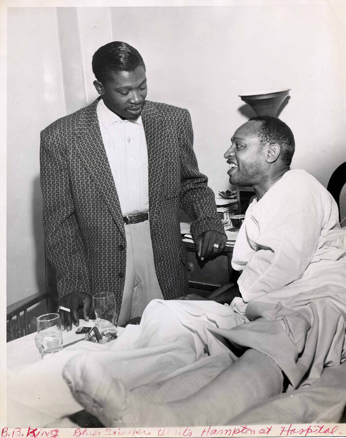 10 x 8 inch photograph. B. B. King visits Lionel Hampton at hospital, [in Albuquerque, NM]