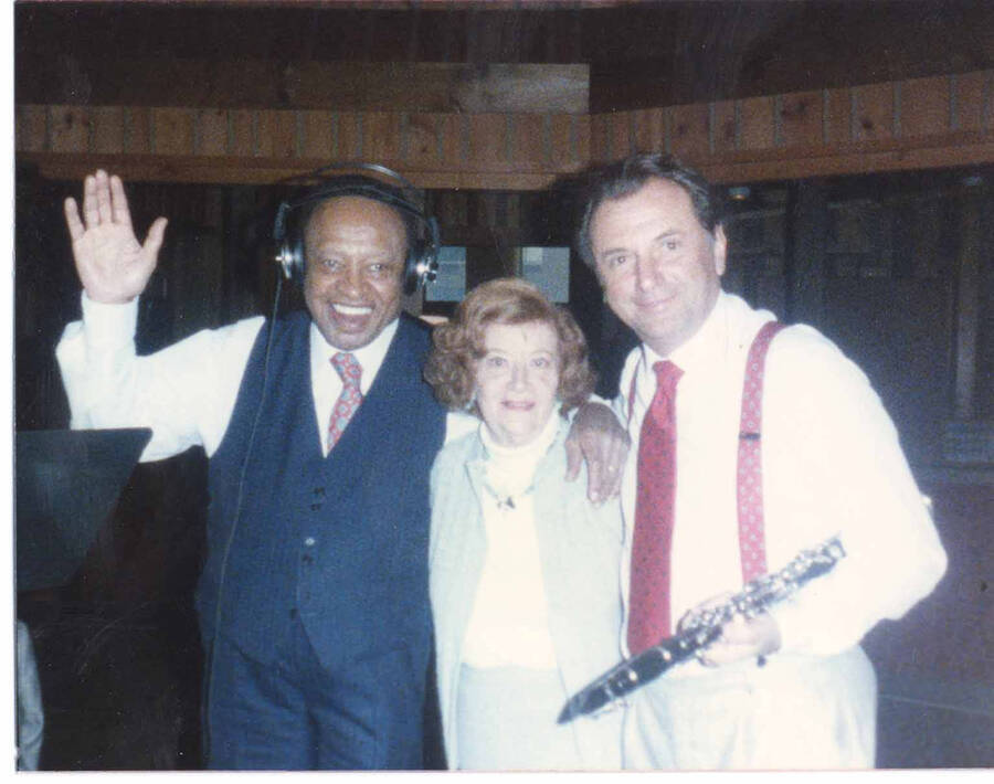 4 x 5 inch photograph. Lionel Hampton with unidentified woman and clarinetist in a recording studio
