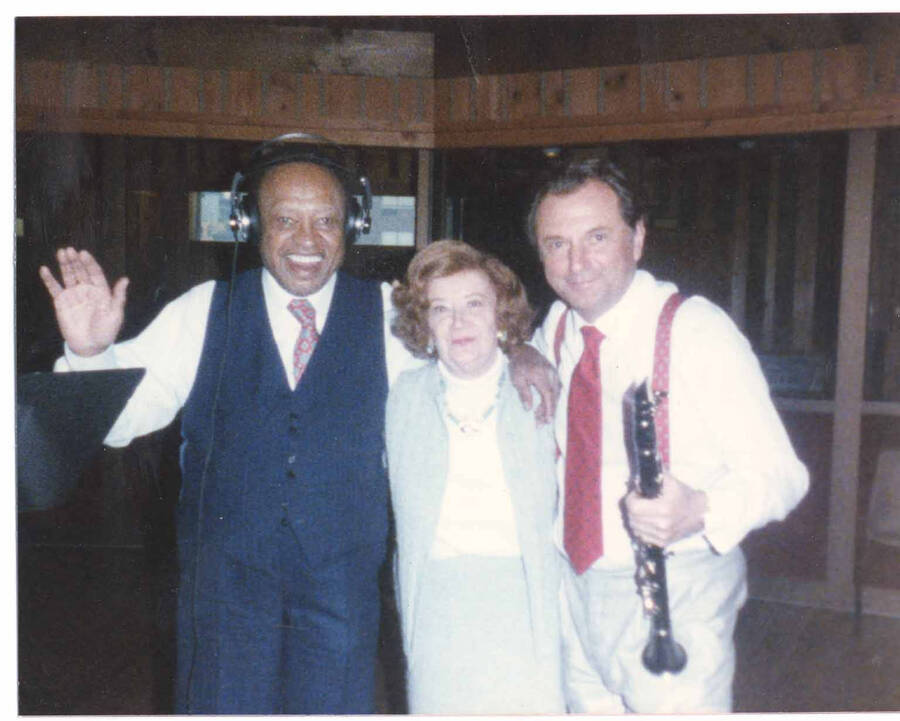4 x 5 inch photograph. Lionel Hampton with unidentified woman and clarinetist in a recording studio