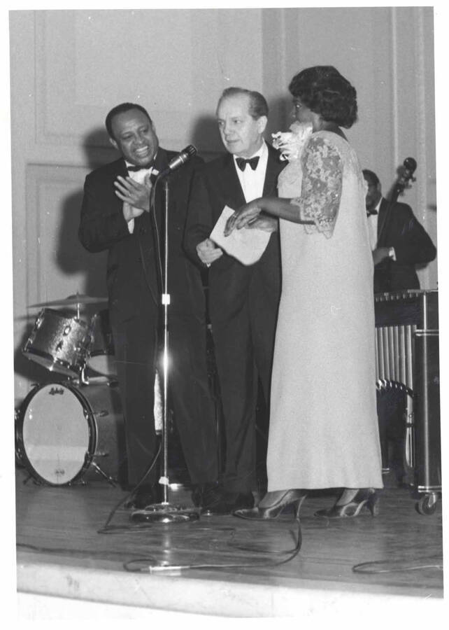 7 x 5 inch photograph. Lionel Hampton with Joey Adams and unidentified woman. New York, NY