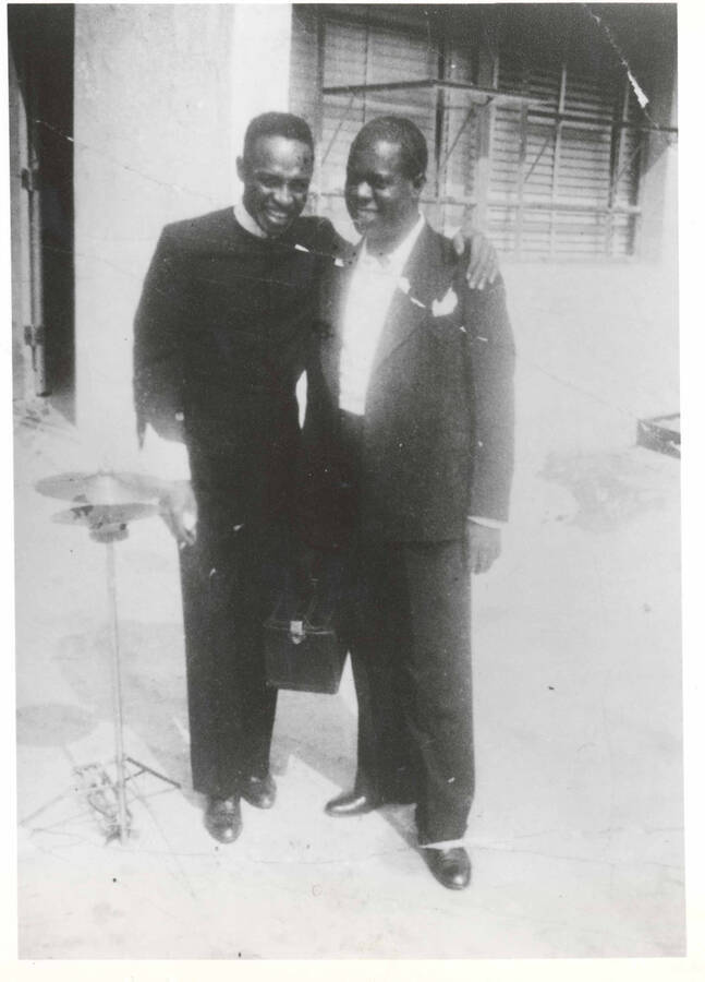10 x 8 inch photograph. Lionel Hampton with Louis Armstrong
