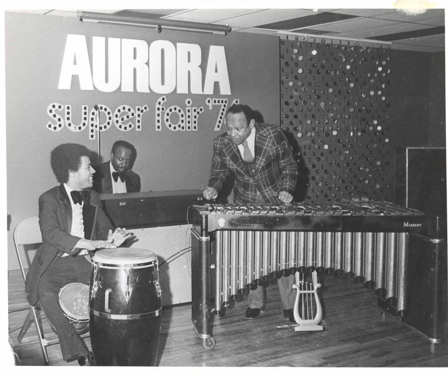 8 x 10 inch photograph. Lionel Hampton on vibraphone with unidentified drummer at the Aurora Super Fair' 74