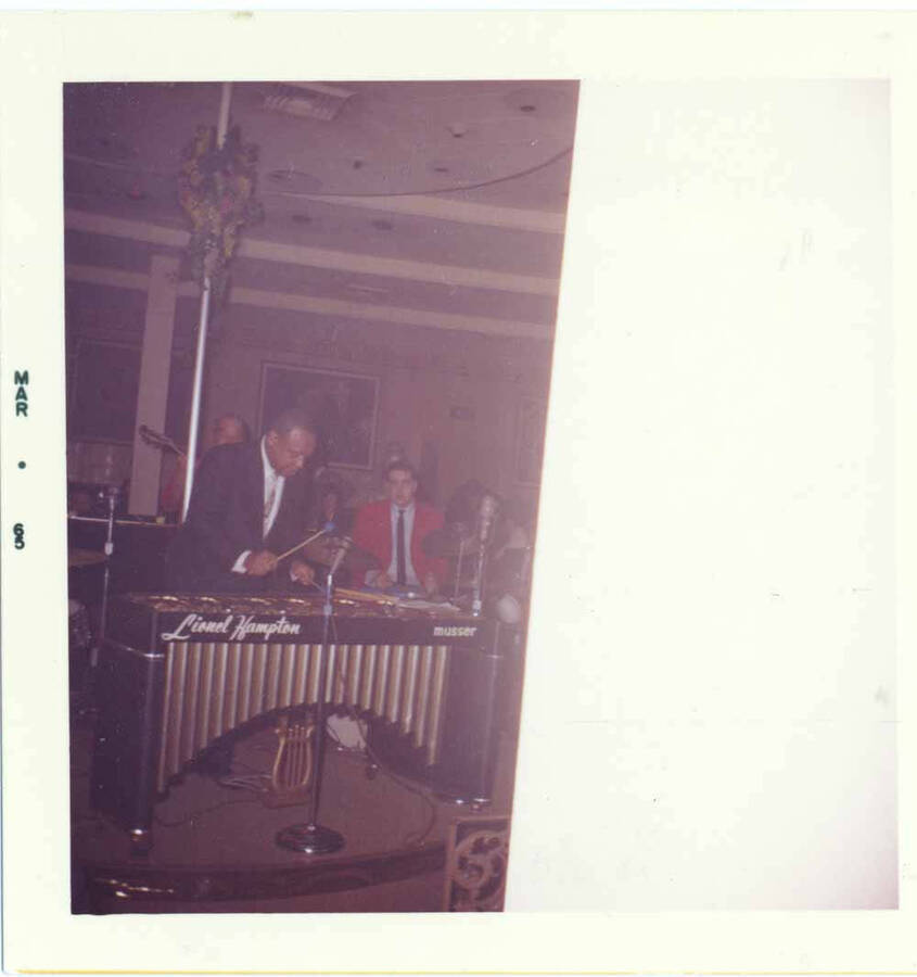3 1/2 x 3 1/2 inch photograph. Lionel Hampton on vibraphone with band [at Al Hirt's New Orleans Bourbon street nightclub]