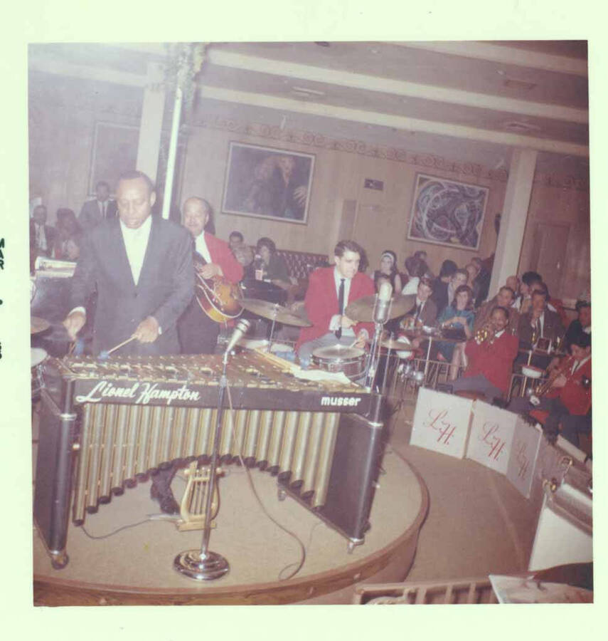 3 1/2 x 3 1/2 inch photograph. Lionel Hampton on vibraphone with band [at Al Hirt's New Orleans Bourbon street nightclub]