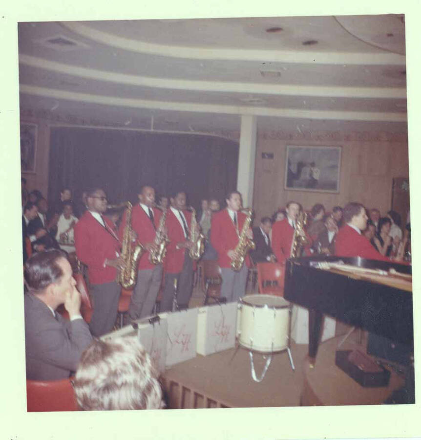 3 1/2 x 3 1/2 inch photograph. Lionel Hampton with band [at Al Hirt's New Orleans Bourbon street nightclub]