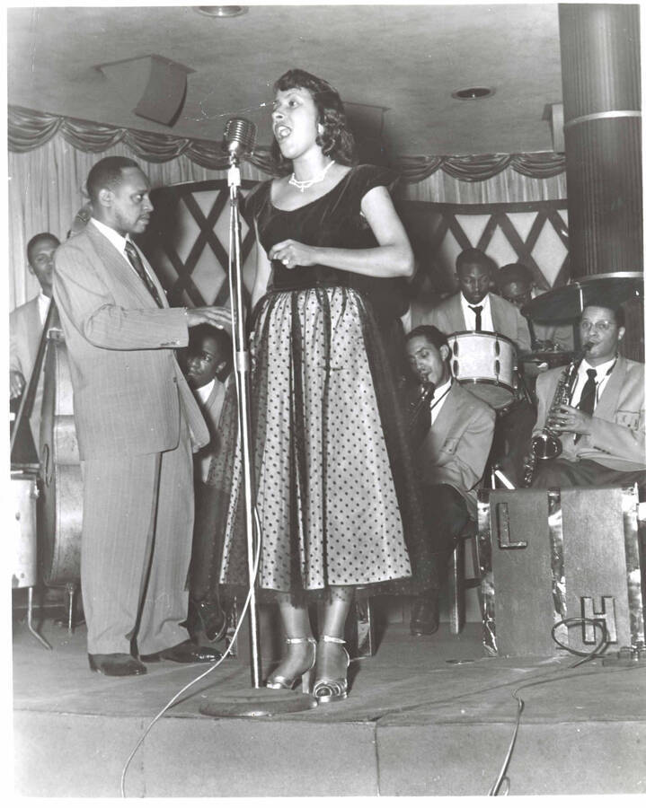 10 x 8 inch photograph. Unidentified vocalist with Lionel Hampton's orchestra