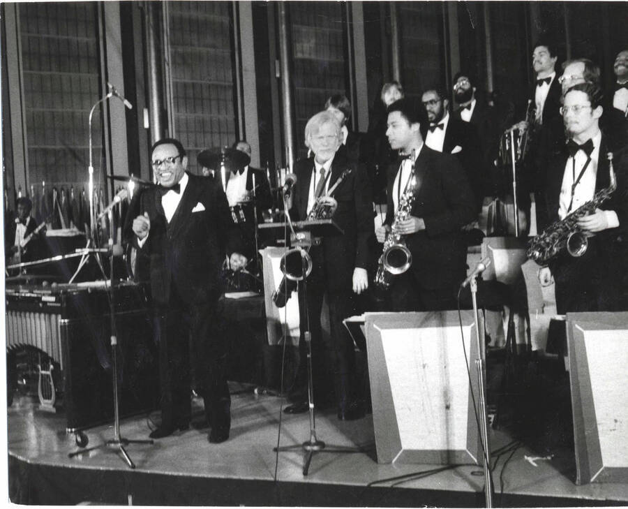 8 x 10 inch photograph. Lionel Hampton with orchestra, on the occasion of his receiving a plaque from the United States Mission that appointed him as Ambassador of Music to the United Nations