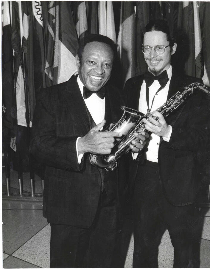 10 x 8 inch photograph. Lionel Hampton with unidentified saxophonist, on the occasion of his receiving a plaque from the United States Mission that appointed him as Ambassador of Music to the United Nations