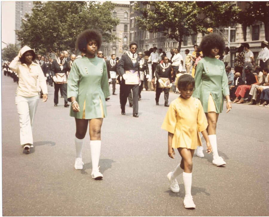 8 x 10 inch photograph. Medina Temple N. 19 Foot Patrol parades on the occasion of the Grand Opening of Lionel Hampton Houses in New York, NY