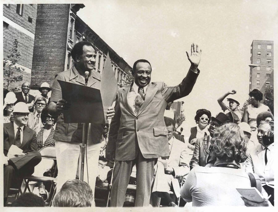 8 x 10 inch photograph. Lionel Hampton with unidentified man at the Grand Opening of Lionel Hampton Houses