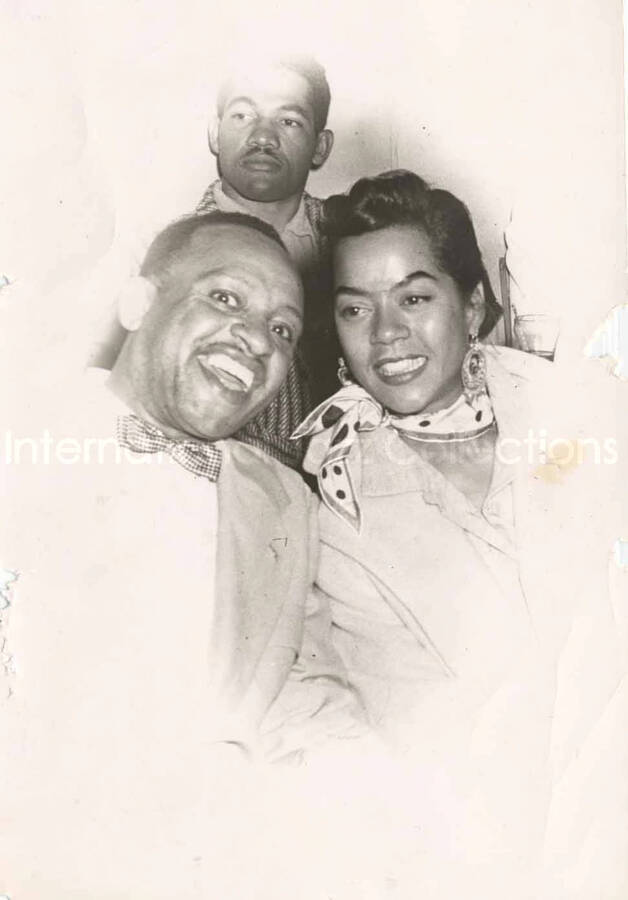 7 x 5 inch photograph. Lionel Hampton with June Eckstine and unidentified man