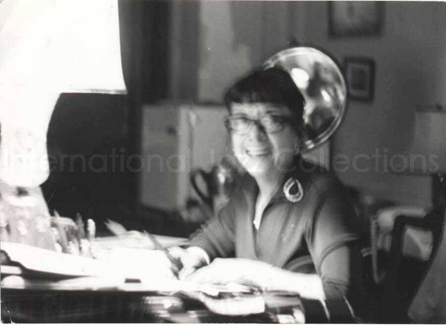 5 x 7 inch photograph. Gladys Hampton at the office