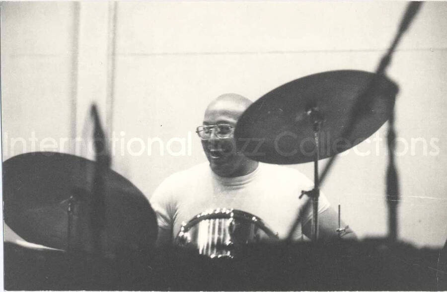4 1/4 x 6 1/2 inch photograph. Lionel Hampton's band. Unidentified drummer