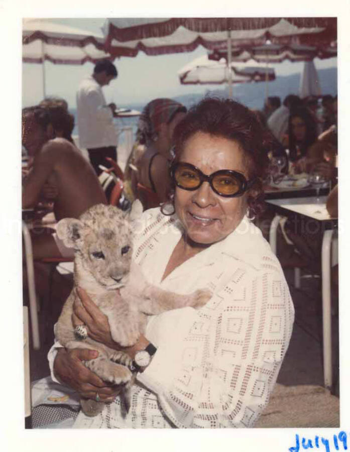 Gladys Hampton in Juan-les-Pins, [Antibes, France]. 4 x 3 1/2 inch Polaroid photograph.