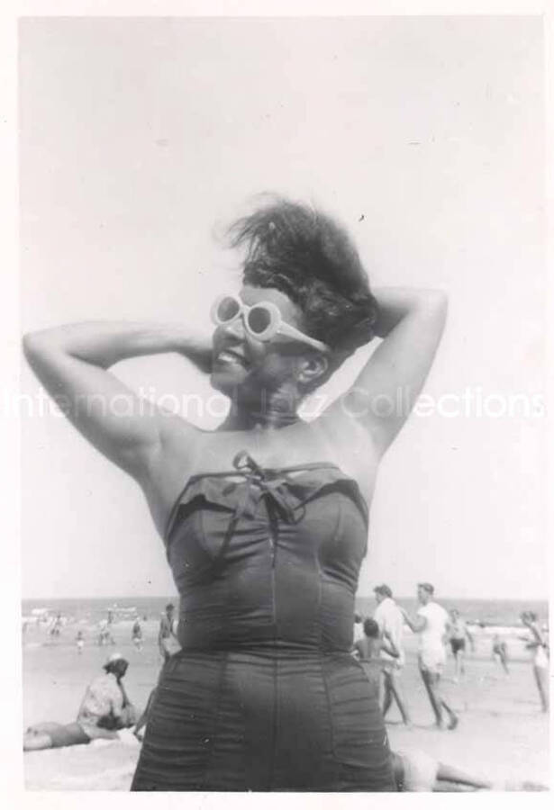 4 1/2 x 3 1/4 inch photograph. Gladys Hampton at the beach