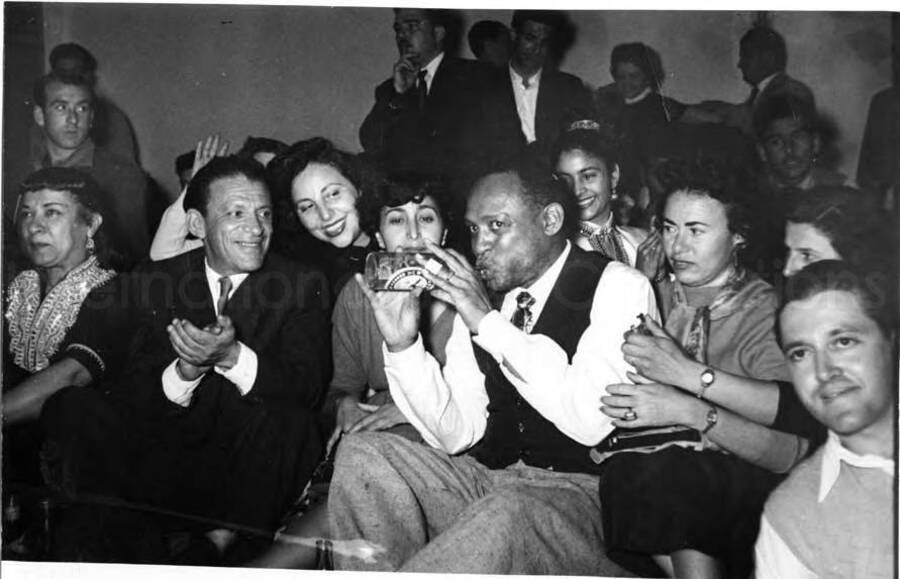 5 x 7 inch photograph. Gladys and Lionel Hampton with band in Israel