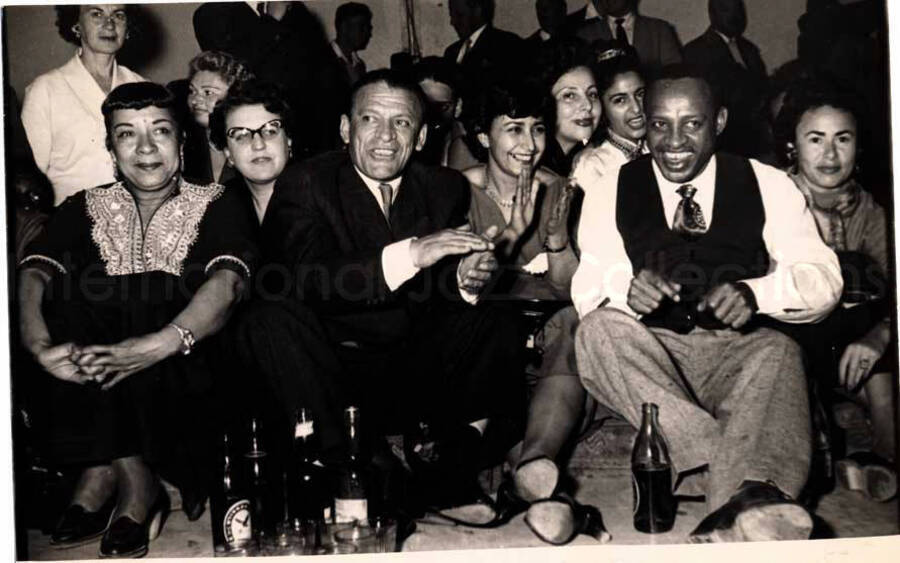 5 x 7 inch photograph. Gladys and Lionel Hampton with band in Israel