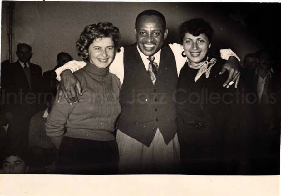 5 x 7 inch photograph. Gladys and Lionel Hampton with band in Israel