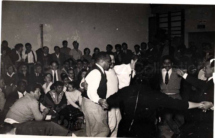 5 x 7 inch photograph. Gladys and Lionel Hampton with band in Israel