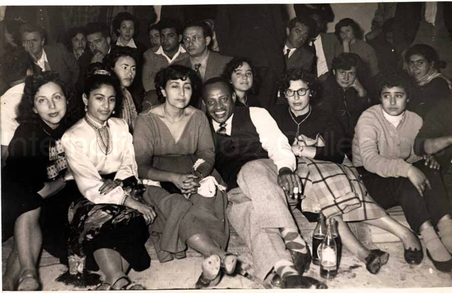 5 x 7 inch photograph. Gladys and Lionel Hampton with band in Israel