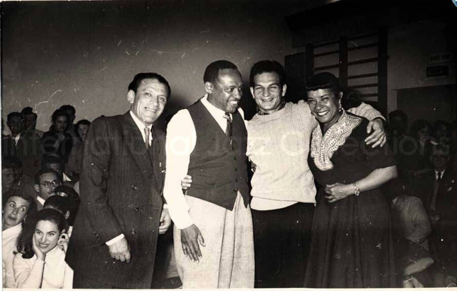 5 x 7 inch photograph. Gladys and Lionel Hampton with band in Israel