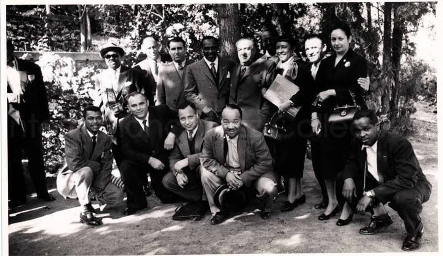 5 x 8 inch photograph. Gladys and Lionel Hampton with band in Israel, including Leo Moore and Billy Mackel