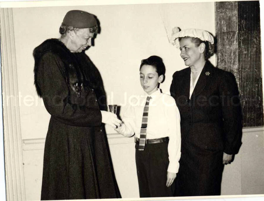 4 x 5 inch photograph. Eleanor Roosevelt with unidentified woman and boy [at the Youth Aliyah conference, Israel]