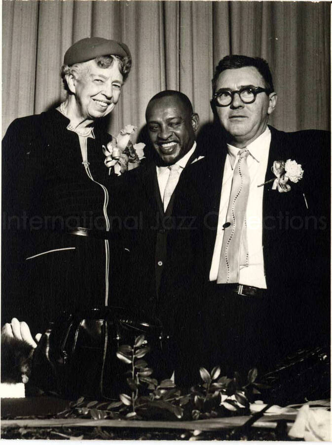 5 x 4 inch photograph. Lionel Hampton with Eleanor Roosevelt and unidentified man [at the Youth Aliyah conference, Israel]