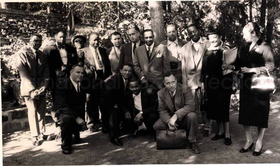 5 x 8 inch photograph. Gladys and Lionel Hampton with band in Israel, including Leo Moore