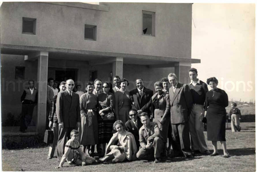 5 x 7 inch photograph. Gladys and Lionel Hampton with unidentified persons and members of the band, including Leo Moore in visit to an archaeological site in Israel. [From a photo album identified as The Outpost Kibbutz of Ramat Rachel?]. See also LH.III.2509