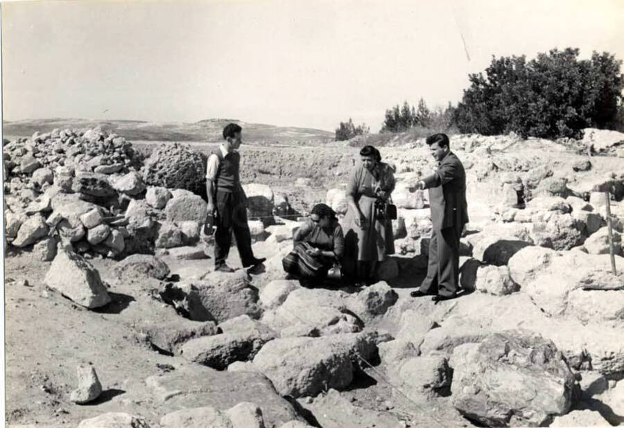 5 x 7 inch photograph. Gladys Hampton with unidentified persons in visit to an archaeological site in Israel. [From a photo album identified as The Outpost Kibbutz of Ramat Rachel?]