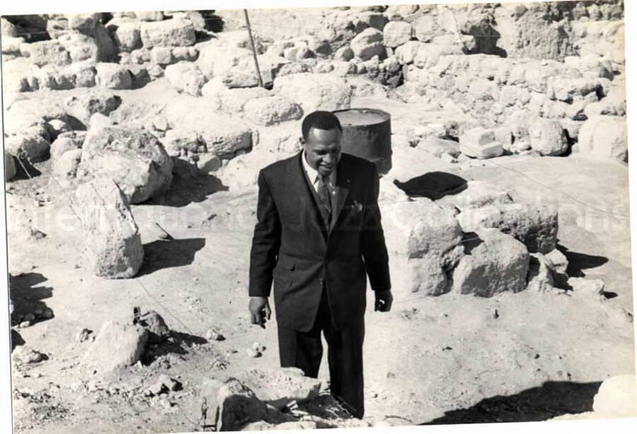 5 x 7 inch photograph. Lionel Hampton with band in visit to an archaeological site in Israel. [From a photo album identified as The Outpost Kibbutz of Ramat Rachel?]. See also LH.III.2499