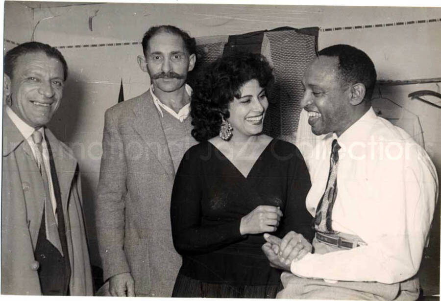 4 1/2 x 6 1/2 inch photograph. Lionel Hampton with unidentified persons in Israel