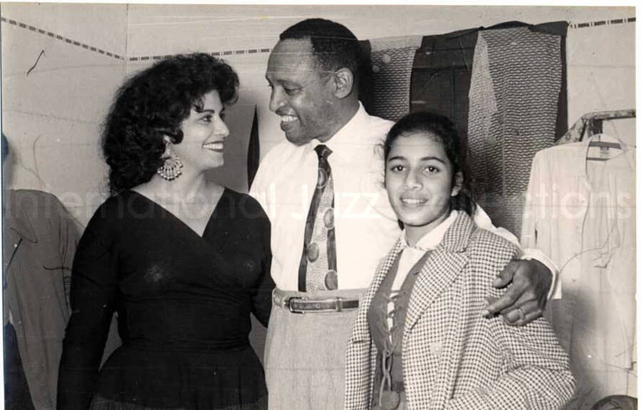 4 1/2 x 6 1/2 inch photograph. Lionel Hampton with unidentified woman and girl in Israel