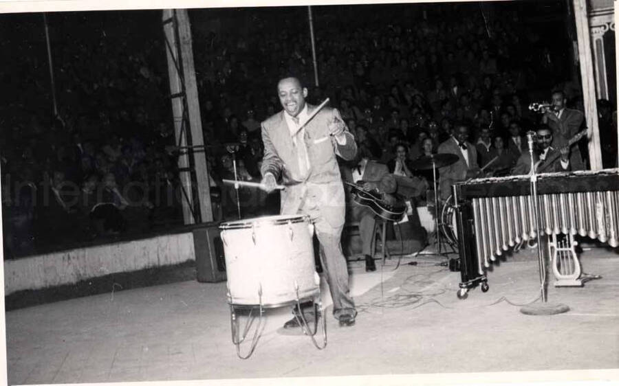 5 x 8 inch photograph. Lionel Hampton performing on drums with band in Israel