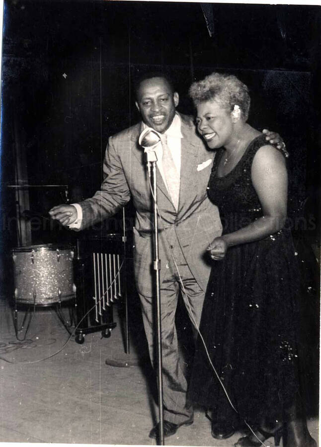 6 x 4 1/2 inch photograph. Lionel Hampton performing with band in Israel. Lionel Hampton with unidentified vocalist