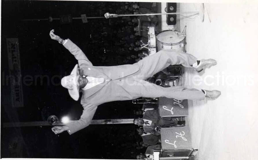 8 x 5 inch photograph. Lionel Hampton performing with band in Israel. [Curley Hamner?] dancing