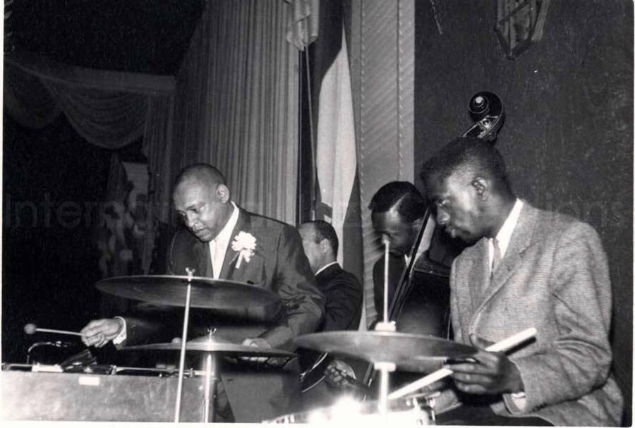 4 x 5 1/2 inch photograph. Lionel Hampton on vibraphone with band, which includes guitarist Billy Mackel, at the Youth Aliyah conference, Israel