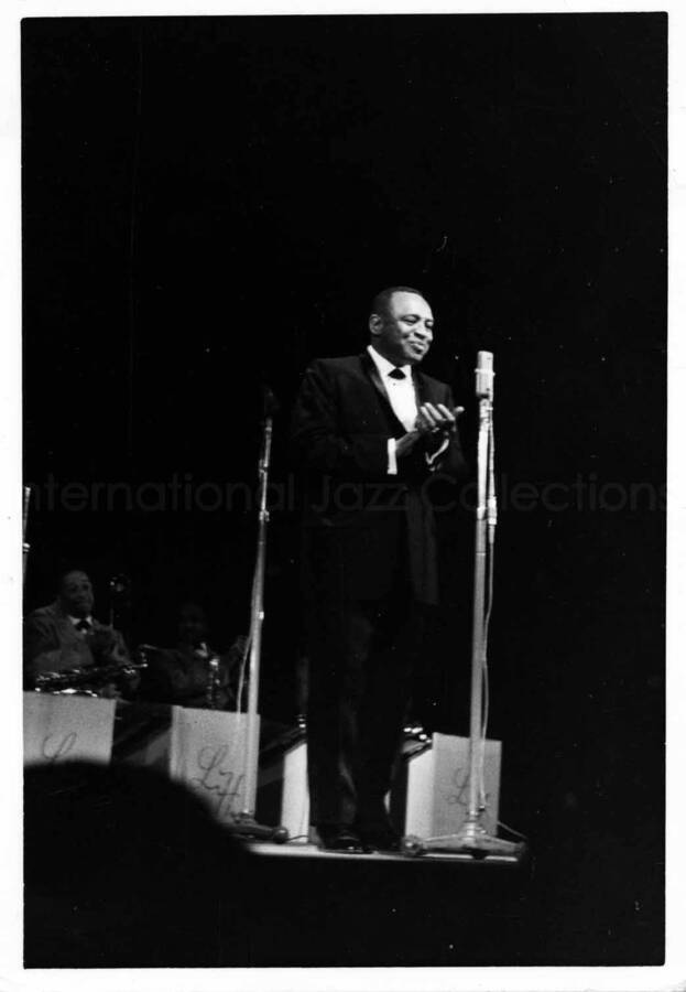 5 x 3 1/2 inch photograph. Lionel Hampton with orchestra [in Japan?]
