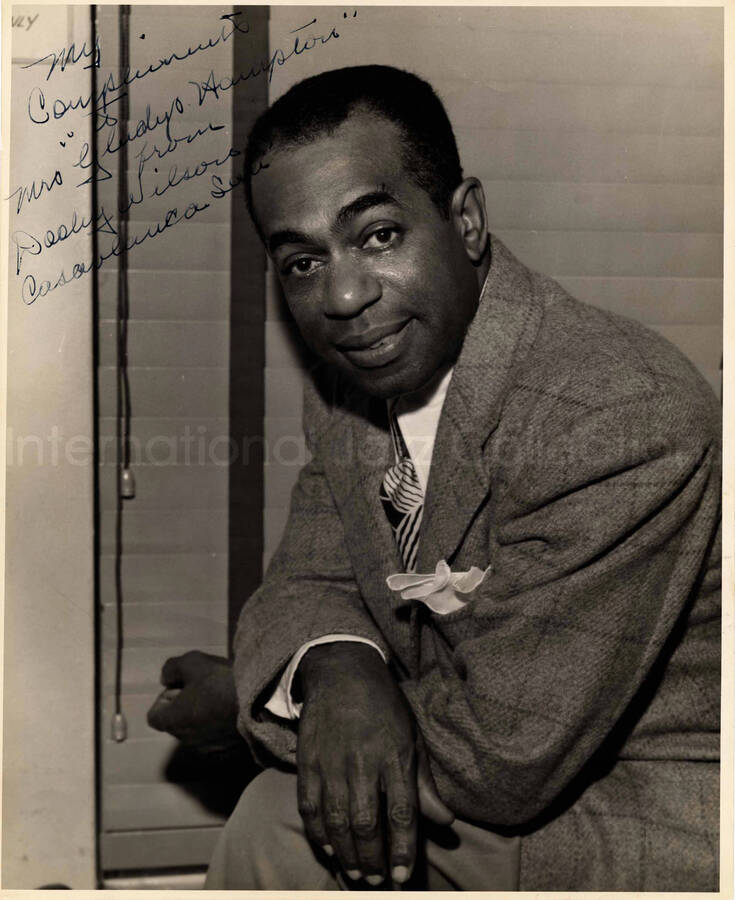 10 x 8 inch photograph. Dooley Wilson. This photograph is dedicated to Gladys Hampton from the Casablanca Sam