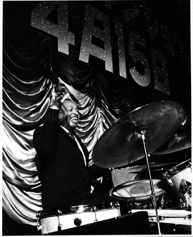 10 x 8 inch photograph. Lionel Hampton performing on the drums [in Japan]