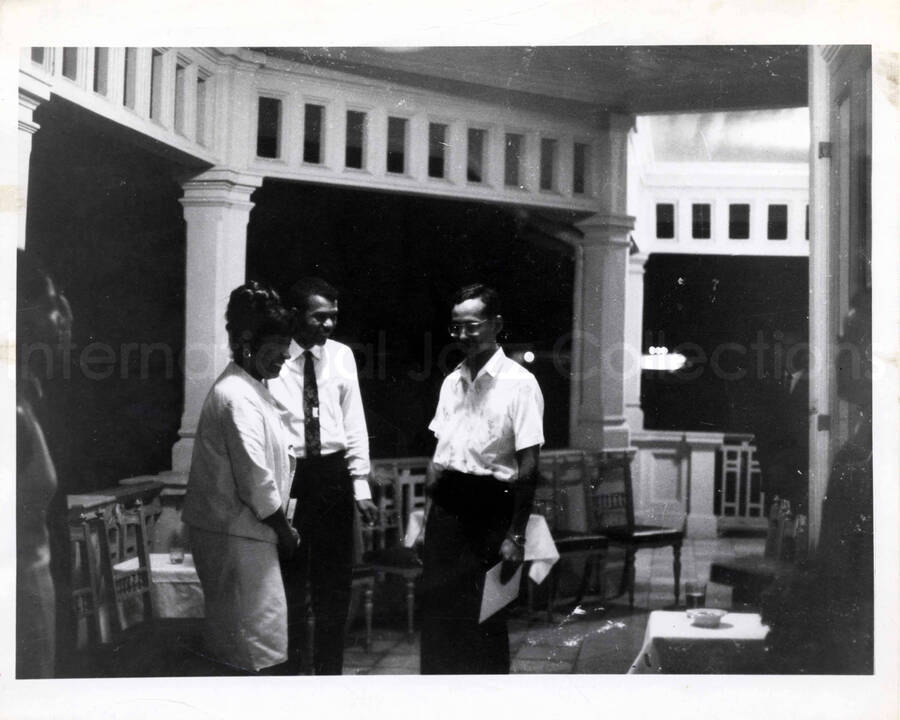 8 x 10 inch photograph. Gladys Hampton with Leo Moore and unidentified man