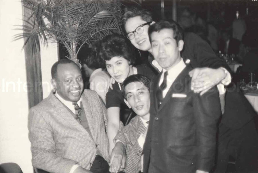 3 x 4 1/2 inch photograph. Lionel Hampton with unidentified persons in Osaka, Japan