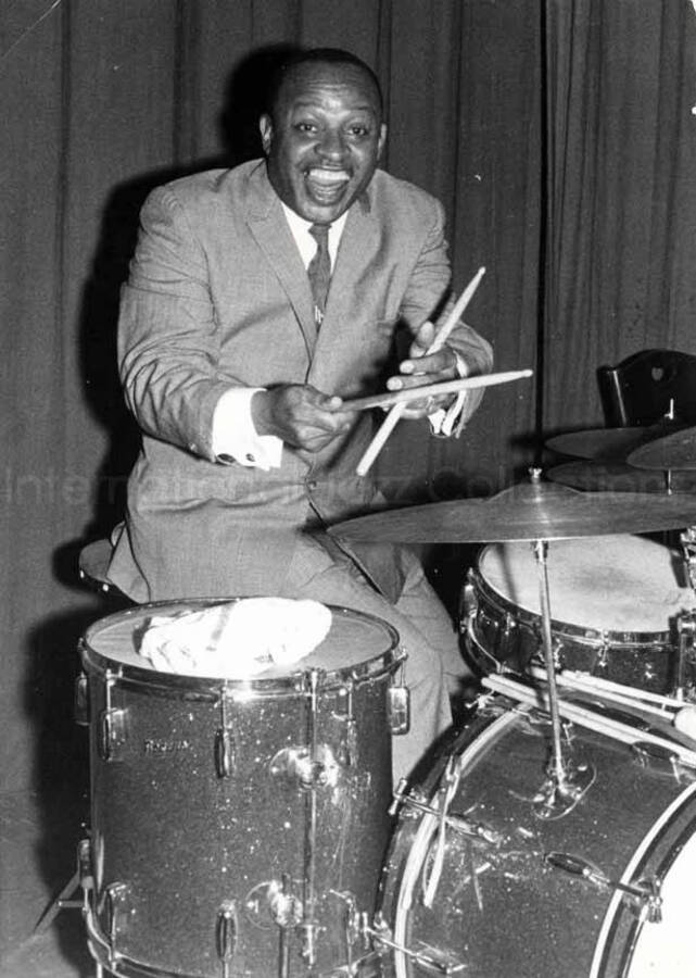 7 x 5 inch photograph. Lionel Hampton playing the drums [in Germany]