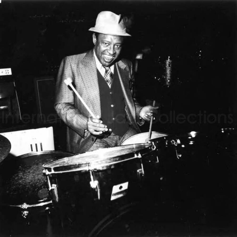 4 1/2 x 4 1/2 inch photograph. Lionel Hampton playing the drums [in Germany]