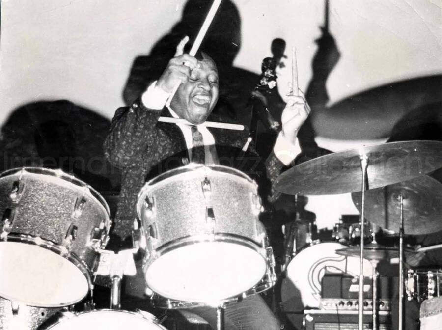 7 x 9 1/2 inch photograph. Lionel Hampton playing the drums